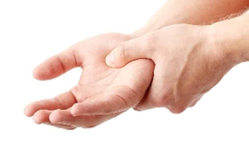 holding hand pain