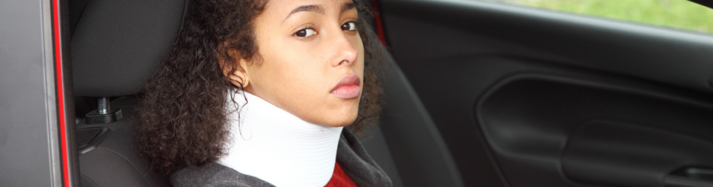 girl in car with neck injury passenger seat
