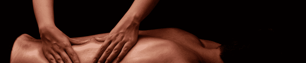 man getting lower back massaged